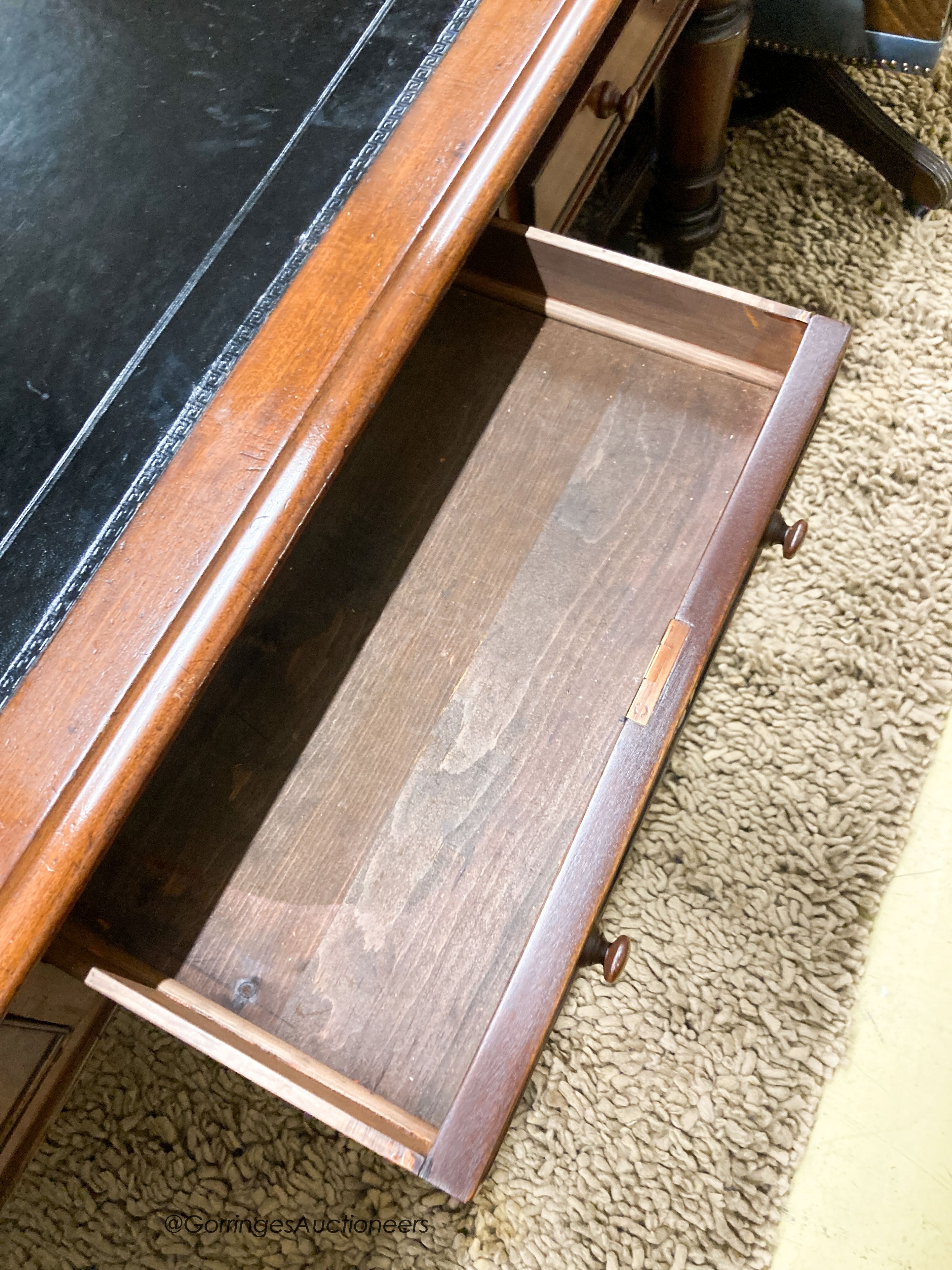 A Victorian mahogany partner's writing table with black leather inset top, length 180cm, depth 102cm, height 72cm